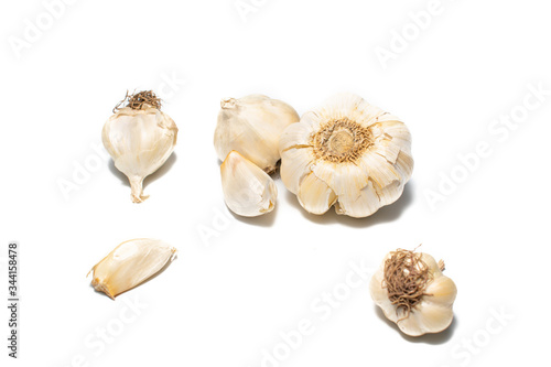 Whole garlic on a white background. Fresh garlic waiting to be peeled and used in food