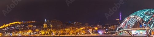 Wide background image of Tbilisi panorama and with The bridge of peace and old town in the Background.Georgia.Sakartvelo.04.03.2020