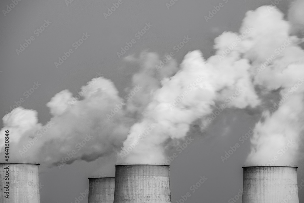 Industrial smoke from chimney on sunset, /black and white photo/ Industrial smoke from chimney on sunset, /black and white photo/