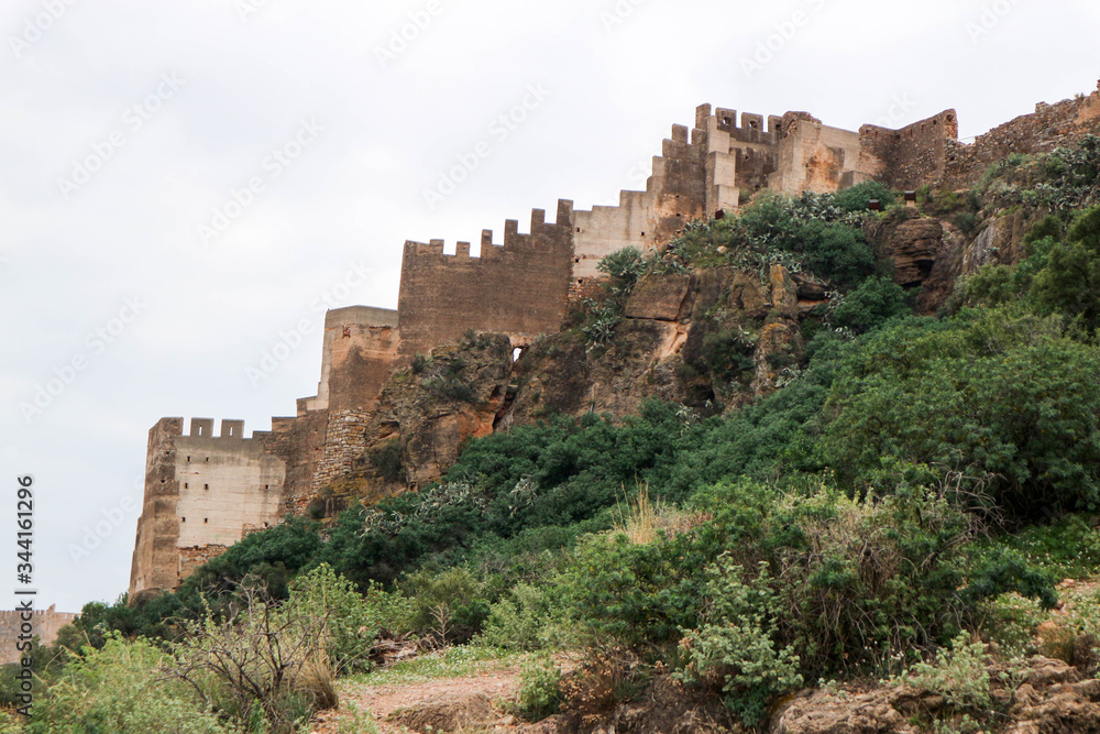 powerful fortifications on the rock of medieval castle of Sagunto, Spain