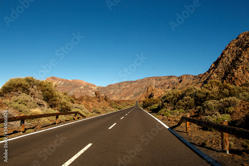 Asphalt road extending into the distance. Teide