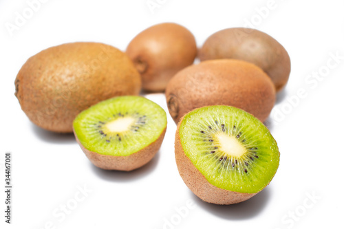 Ripe kiwi on a white background. Fresh green exotic fruit, waiting to be eaten