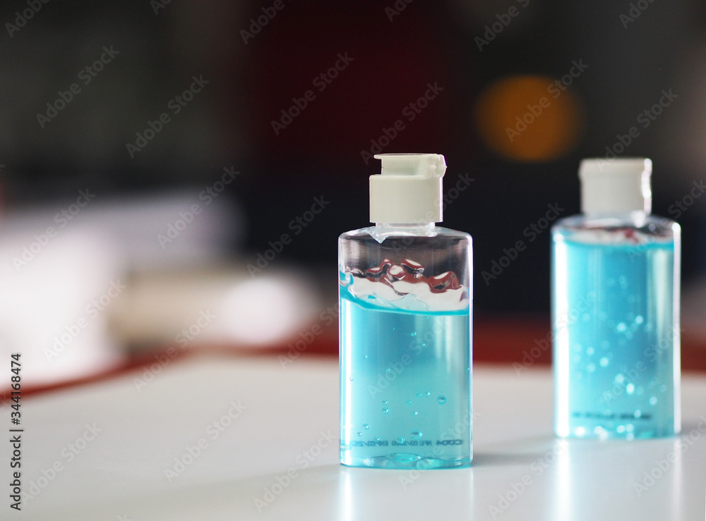 Hand Sanitizer, gel alcoholic mixture with gelatin in clear Plastic bottle with pump pushing wash clean dirty to prevent germs protect Contagious disease corona virus, covid-19 Hand Sanitizer, gel alcoholic mixture with gelatin in clear Plastic bottle with pump pushing wash clean dirty to prevent germs protect Contagious disease corona virus, covid-19