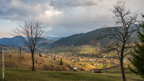 Idyllic rural landscape in the Romania with a beautiful light and shadows. Background