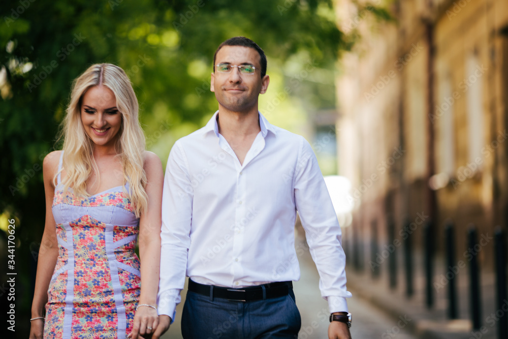 Romantic tourist couple walking around the city relaxing