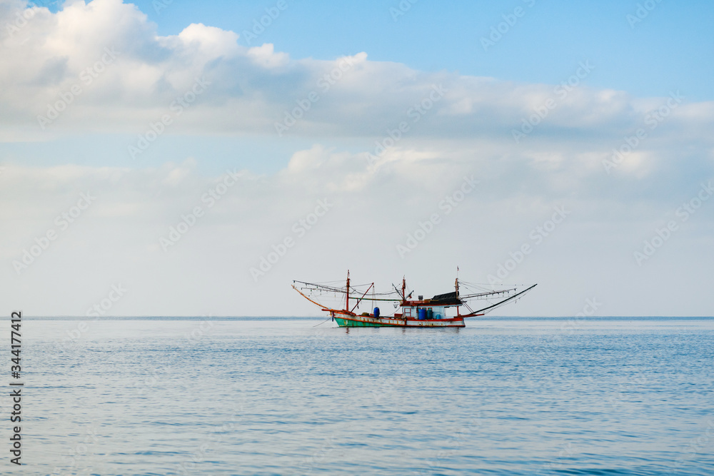 Floating colorful fishing boat at Thailand sea