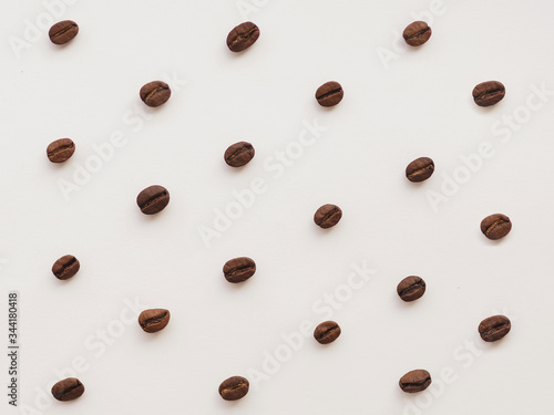 coffee beans on a white background pattern top view