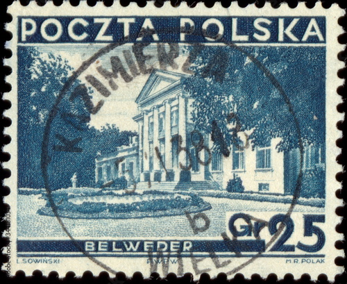 Kazimierza Wielka. Będzin. Kasownik pocztowy (1938) odbity na znaczku pocztowym, przedstawiającym Belweder.