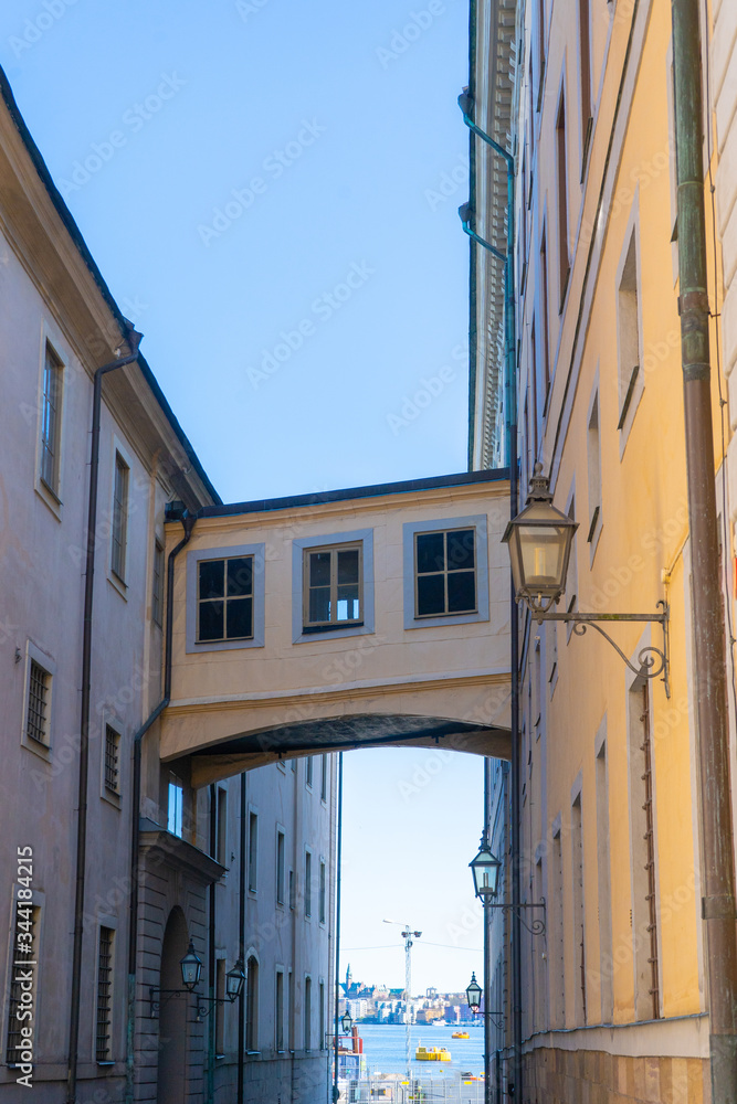 Narrow street in Stockholm. The old town (gamla stan) of the Swedish capital. Photo of medieval architecture.