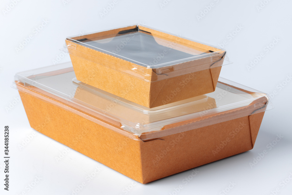 Cardboard brown food box pack isolated on white background close up Cardboard brown food box pack isolated on white background close up