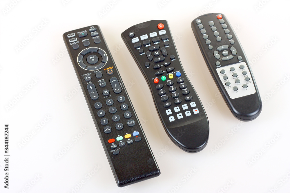 Three different versions of remote controls on White background. Three different versions of remote controls on White background.