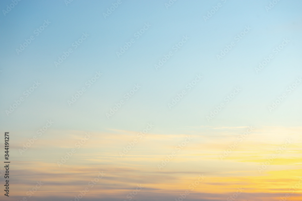 Beautiful clear, morning sky at sunrise, natural background. Soft pink clouds.