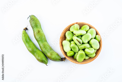 Wallpaper Mural Fresh broad bean pods and broad beans on white background Torontodigital.ca