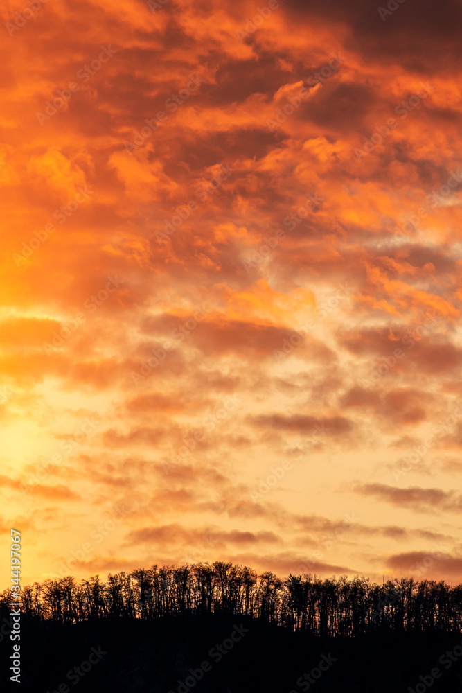 Vivid orange clouds in the sky, Bohinj valley