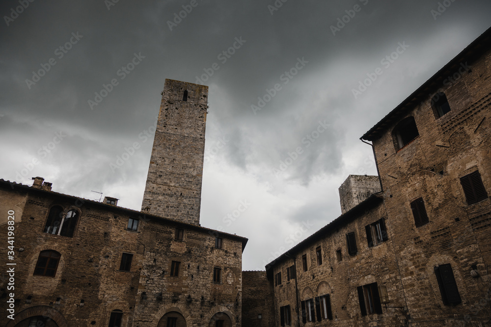 Stormy weather over high towers of San Gimignano, Tuscany, Italy