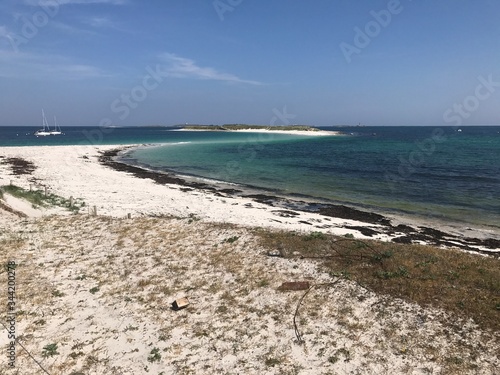 beach with clear sand and turquoise sea