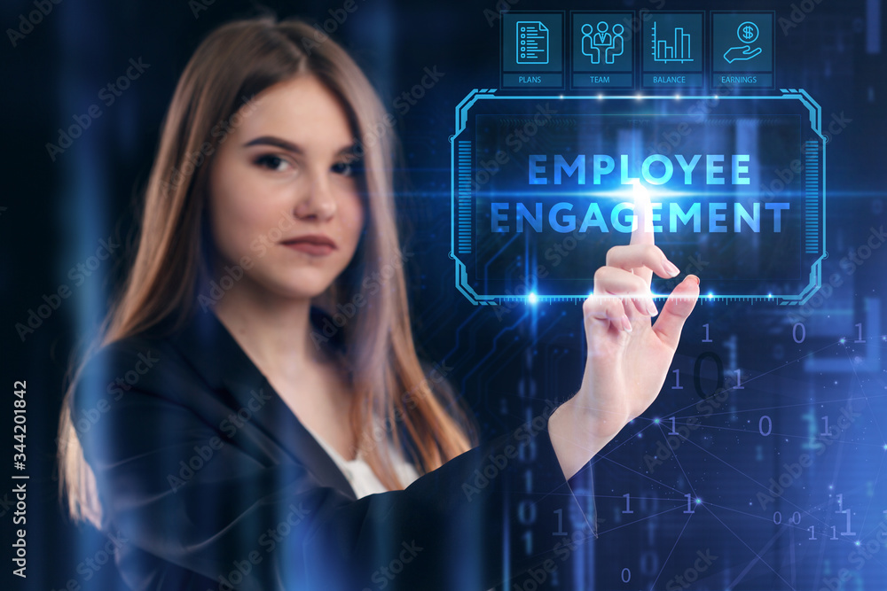 Business, Technology, Internet and network concept. Young businessman working on a virtual screen of the future and sees the inscription: Employee engagement