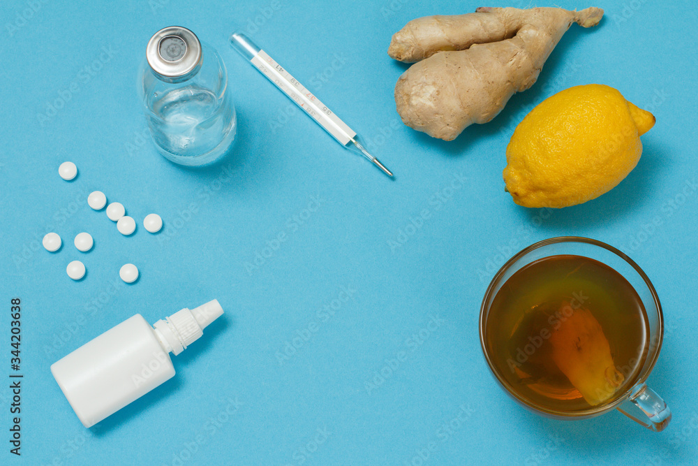 Mercury thermometer, glass bottle, pills and health remedy foods for cold and flu relief. Mercury thermometer, glass bottle, pills and health remedy foods for cold and flu relief.