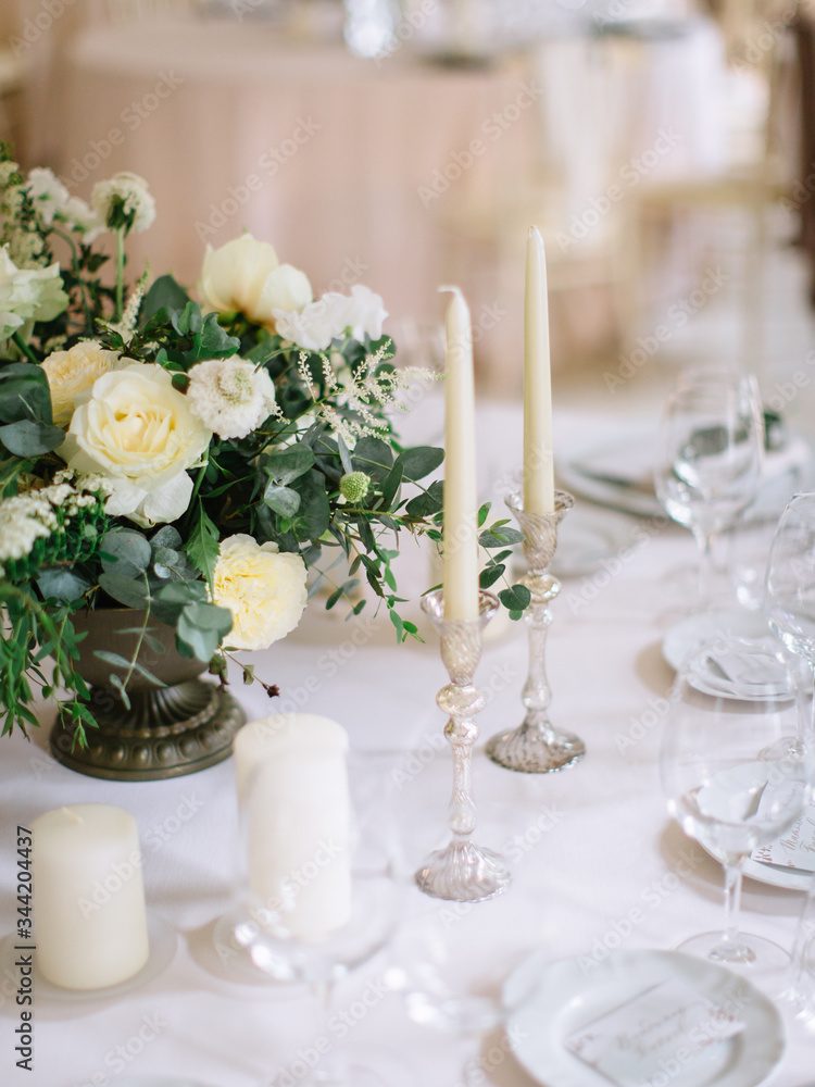 wedding decor, served tables, ivory, with candles, glasses, beautiful wooden tables, inside the Italian old Villa wedding decor, served tables, ivory, with candles, glasses, beautiful wooden tables, inside the Italian old Villa