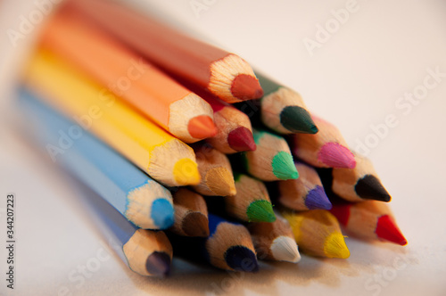 colored pencils on white background