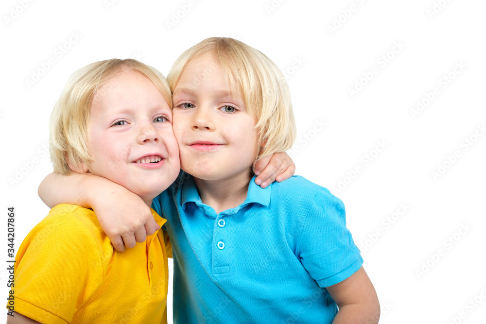 Two caucasian boys brothers posing in studio Two caucasian boys brothers posing in studio