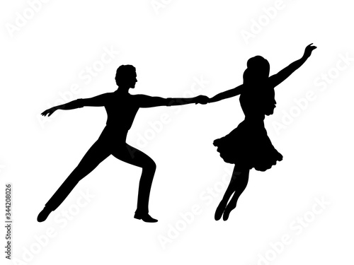 Silhouette of man and woman in dance