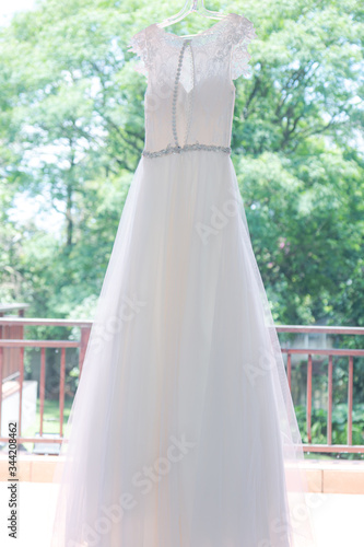 White wedding dress on a hanger