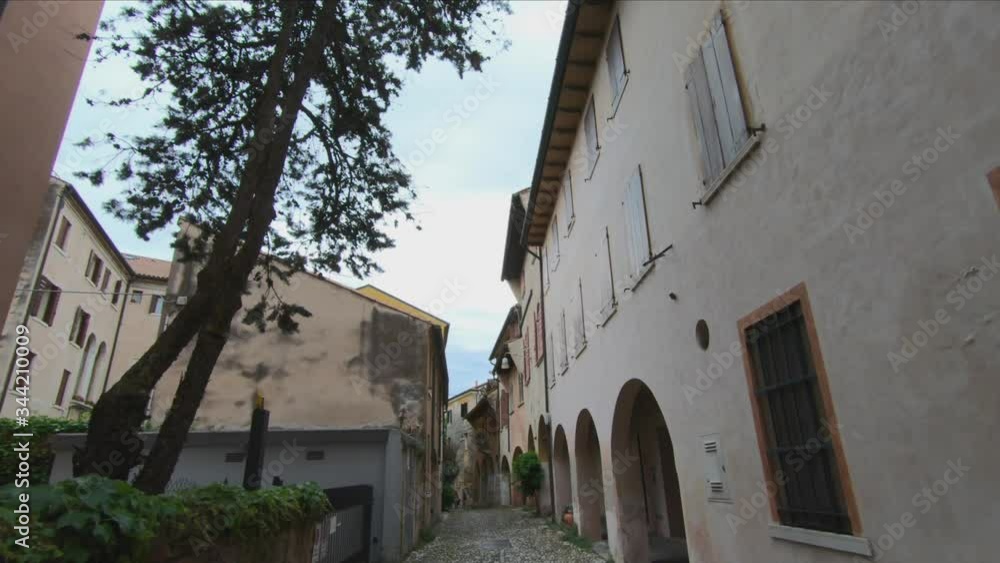 DOLLY SHOT - Colonnades of 14th-century houses in Vicolo Dotti, Treviso, Italy. DOLLY SHOT - Colonnades of 14th-century houses in Vicolo Dotti, Treviso, Italy.
