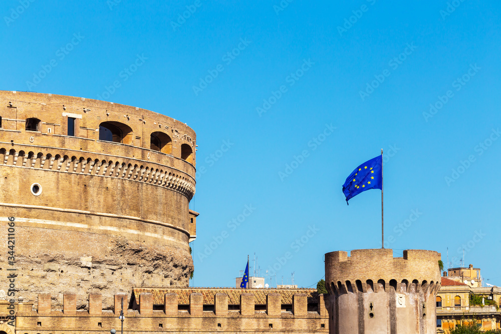 Castel Sant'Angelo (Castle of the Holy Angel, also Mausoleum of Hadrian) and European Union flag in Rome, Italy