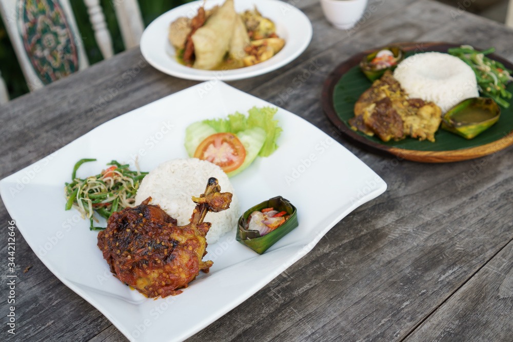 ayam balado. indonesian food cuisine chicken with chilli paste served with rice