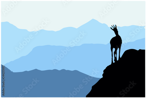 A chamois stands on top of a hill with mountains in the background. Black silhouette with blue background. Vector illustration. © Anna