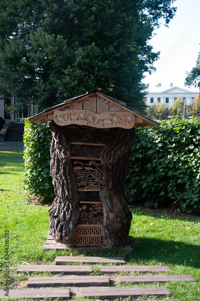 Naklejka premium House for firewood in the Park