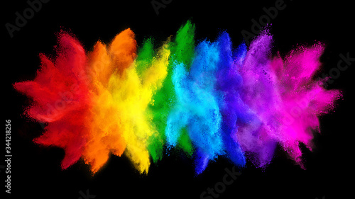 colorful rainbow holi paint color big double powder explosion isolated dark black wide panorama background. peace rgb beautiful party concept