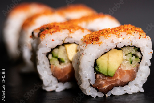 Salmon roll with avocado, sushi ready to eat