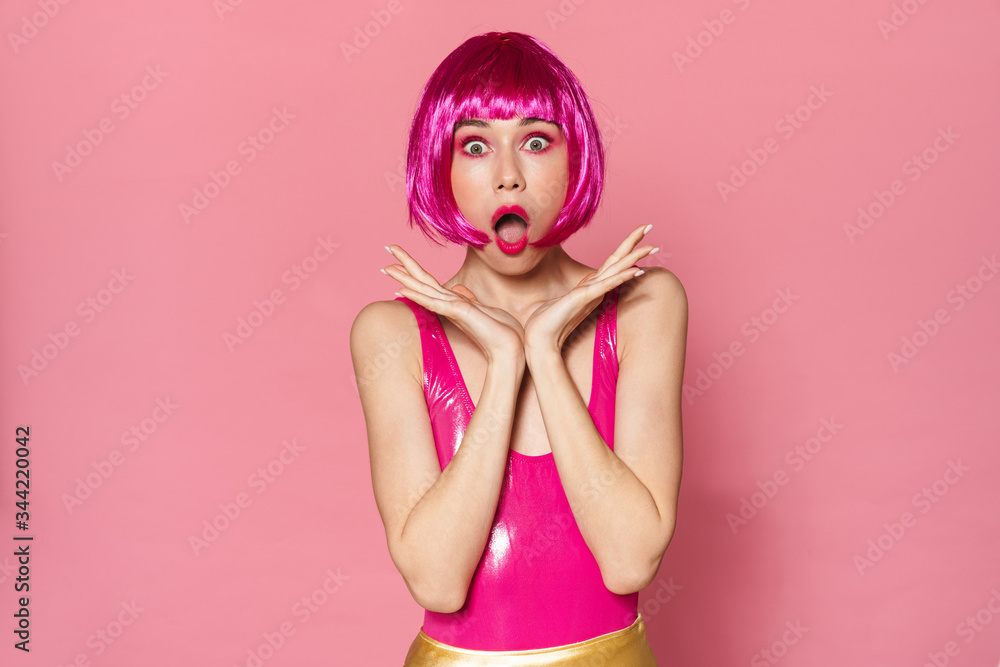 Image of shocked beautiful woman in wig expressing surprise at camera Image of shocked beautiful woman in wig expressing surprise at camera