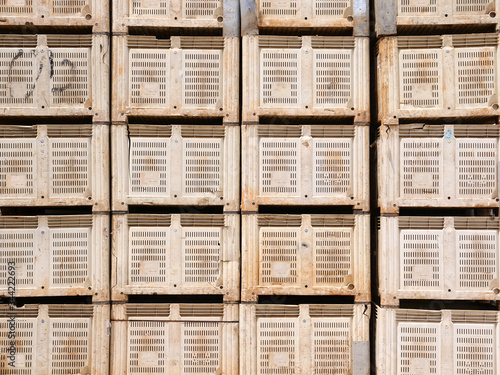 Empty pallets stacked in a packing factory.
