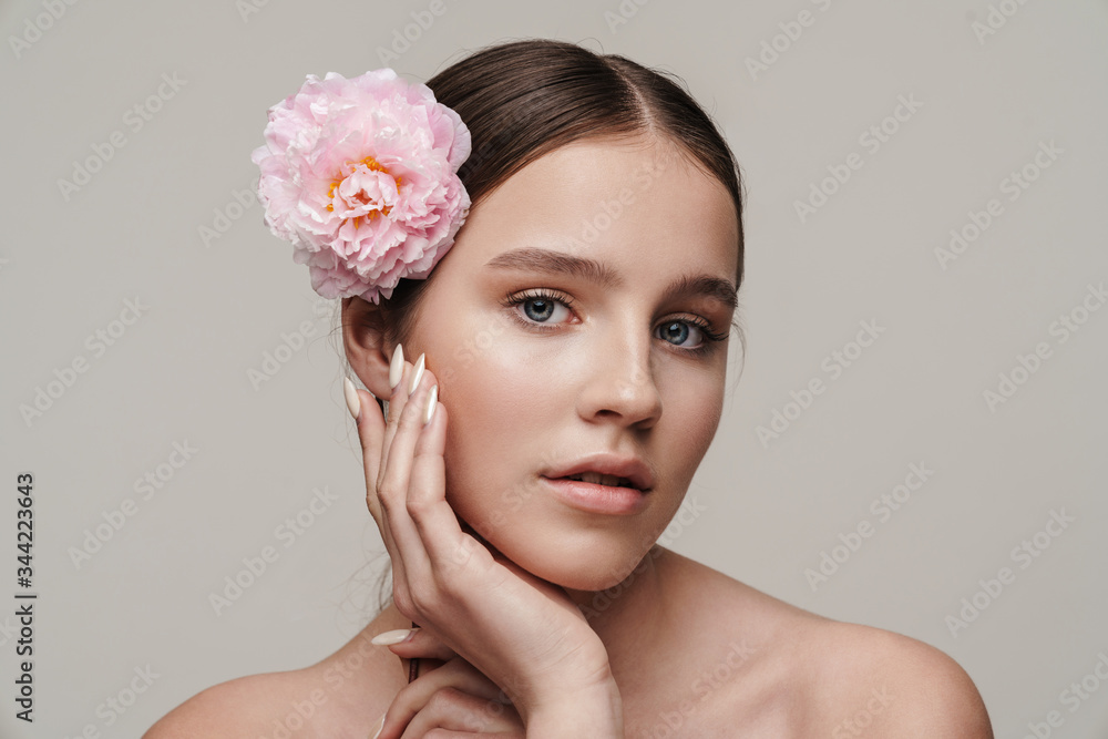 Image of seductive nice shirtless woman posing with pink peony Image of seductive nice shirtless woman posing with pink peony
