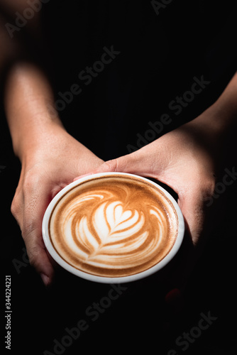 Holding A Cup Of Latte