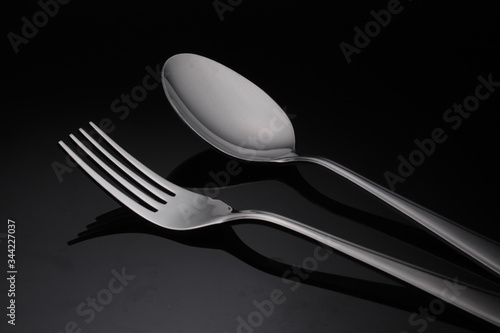 fork and spoon, fork and spoon on black background