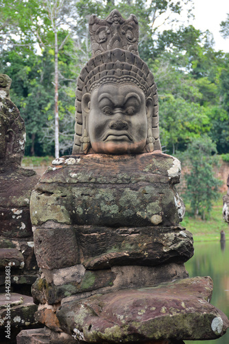 Angkor Thom  one of the ancient cities of the Khmer Empire in Cambodia. Statue of a demon  asura 