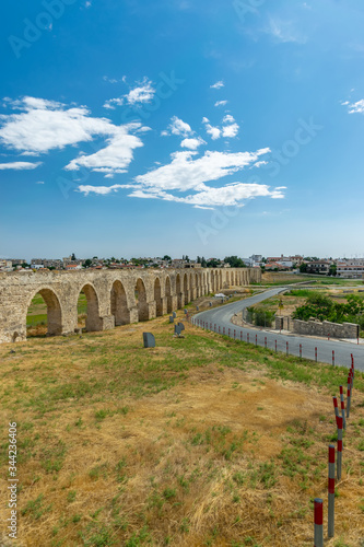 Fototapeta Naklejka Na Ścianę i Meble -  The picturesque ancient aqueduct is located near the city of Larnaca.