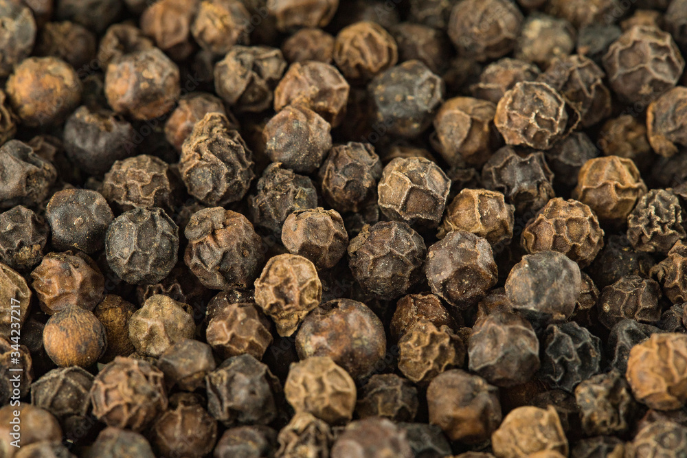Black peppers peas background Black peppers peas background