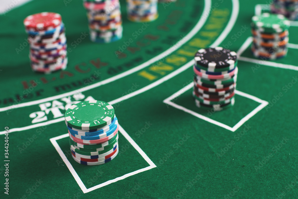 Casino equipment placed on the green floor for risky gambling for the people who want to get rich. Casino equipment placed on the green floor for risky gambling for the people who want to get rich.