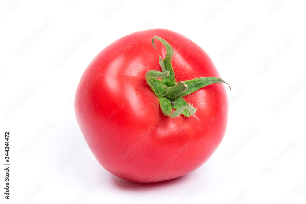 Red fresh tomato isolated on white background in close-up