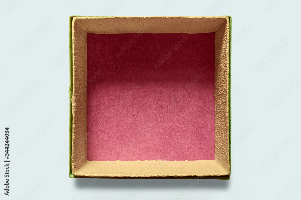 Fototapeta premium Close-up of box coated with colored paper, top view