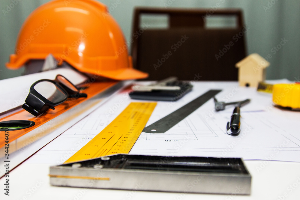 Engineer and Architect drawings blueprint at Construction Site Engineer and Architect drawings blueprint at Construction Site