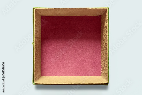 Close-up of box coated with colored paper, top view