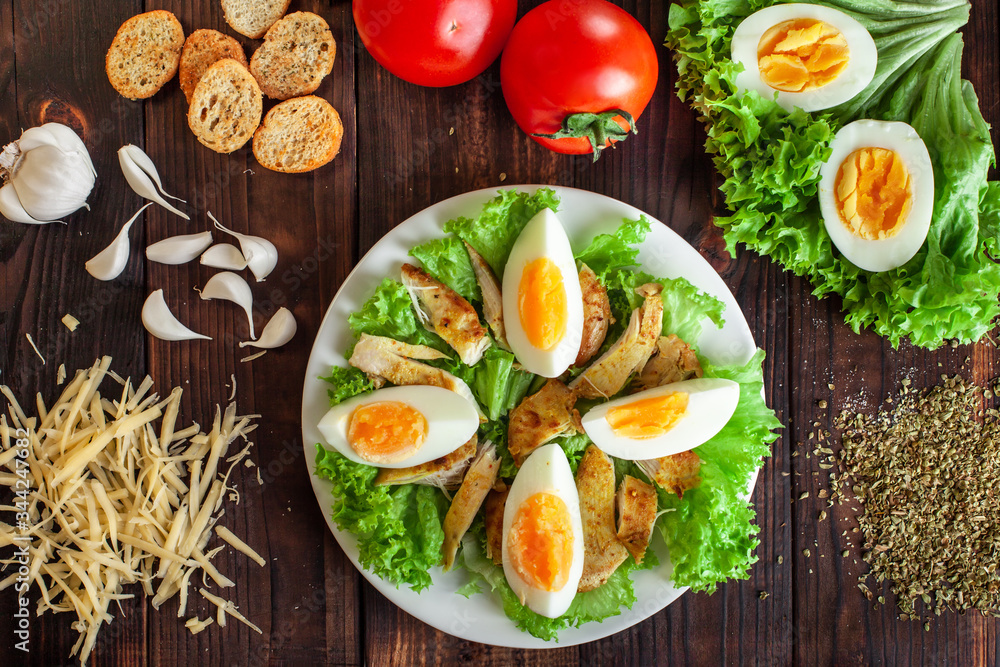 .Instructions for the preparation of Caesar salad. Step Four Slice the eggs into slices and lay on top of the salad. .Instructions for the preparation of Caesar salad. Step Four Slice the eggs into slices and lay on top of the salad.