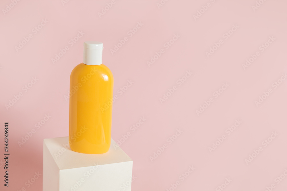 Sunscreen cream bottle for package mockup design. Minimal summer skin care concept background. Sun protection lotion. Sunscreen cream bottle for package mockup design. Minimal summer skin care concept background. Sun protection lotion.