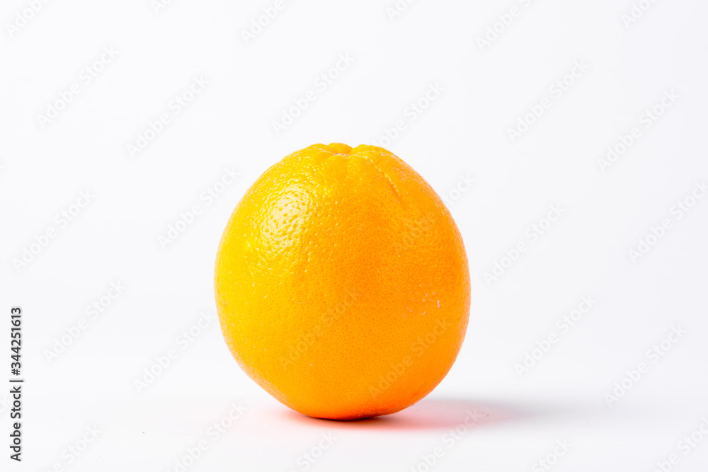 Portrait Of Single Orange Against White Background Portrait Of Single Orange Against White Background